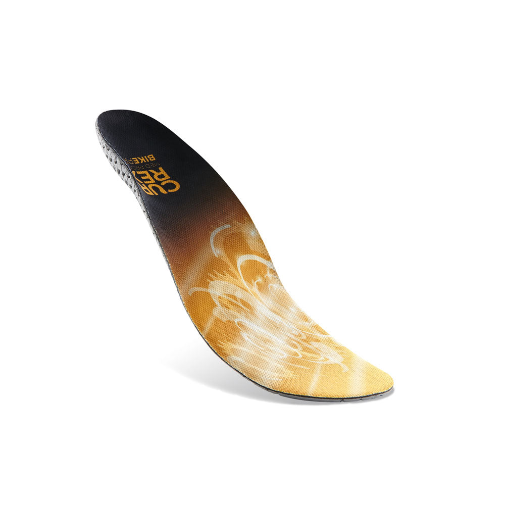 Floating top view of yellow colored BIKEPRO medium profile insoles with gray, red and black base #1-wahle-dein-profil_med