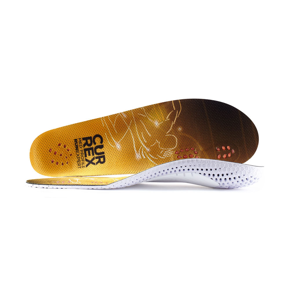 View of pair of yellow medium profile RUNEXPERT insoles, one standing on side to show top of insole, second insole set in front showing its profile while toe is facing opposite direction #1-wahle-dein-profil_med