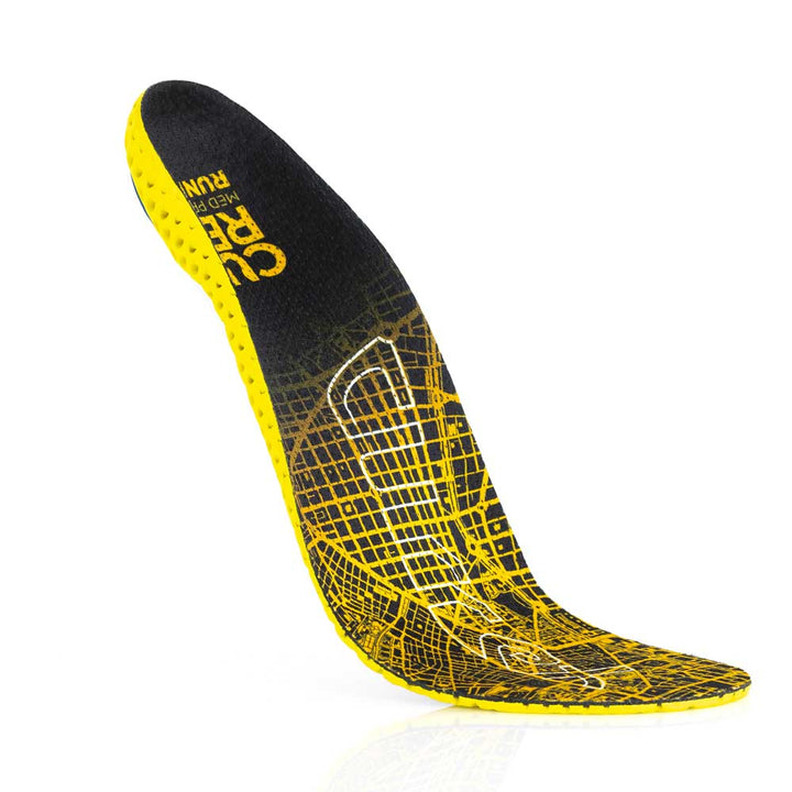 Floating top view of yellow colored RUNPRO medium profile insoles with yellow base #1-wahle-dein-profil_med