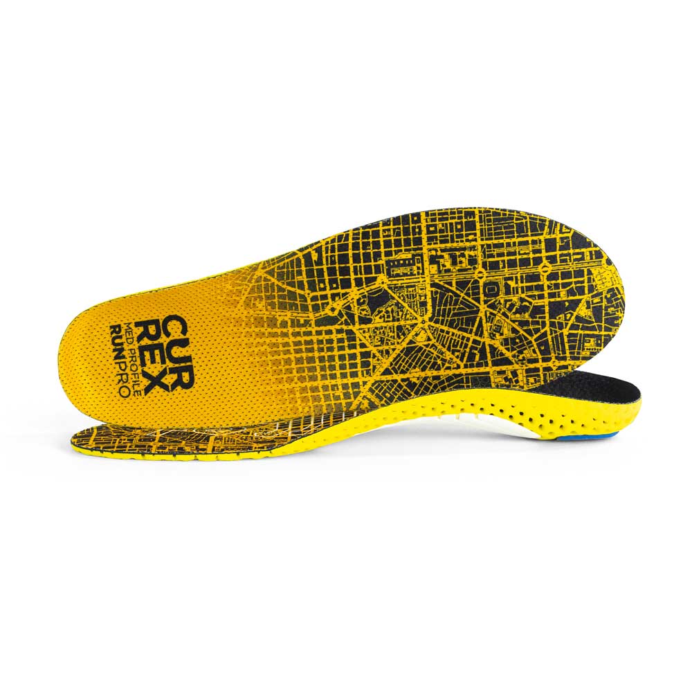 View of pair of yellow medium profile RUNPRO insoles, one standing on side to show top of insole, second insole set in front showing its profile while toe is facing opposite direction #1-wahle-dein-profil_med
