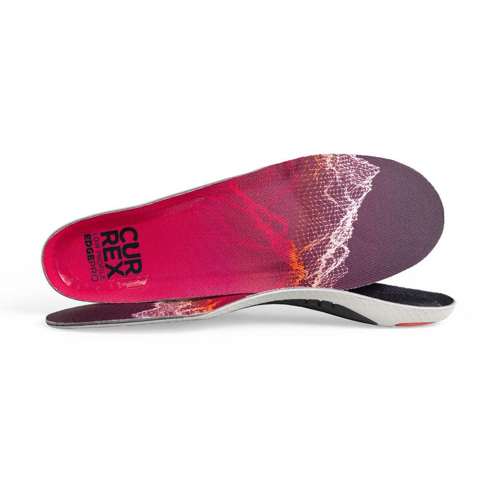 View of pair of red low profile EDGEPRO insoles, one standing on side to show top of insole, second insole set in front showing its profile while toe is facing opposite direction #1-wahle-dein-profil_low