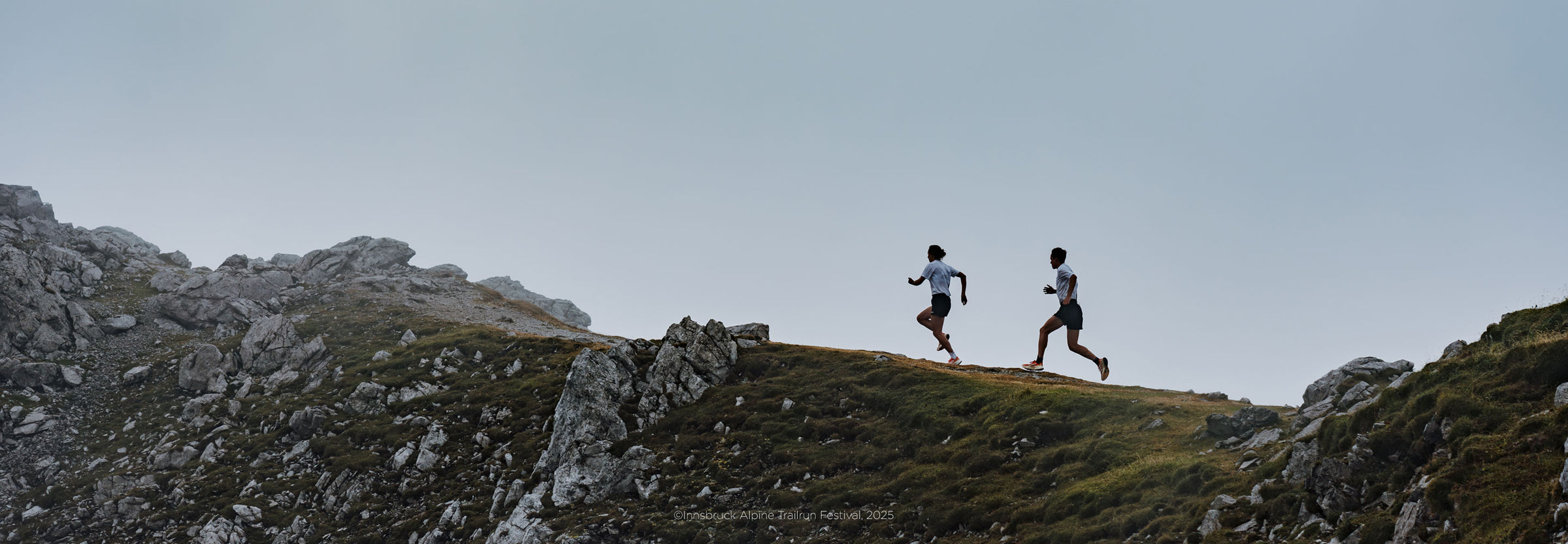 People running along the mountainside in IATF